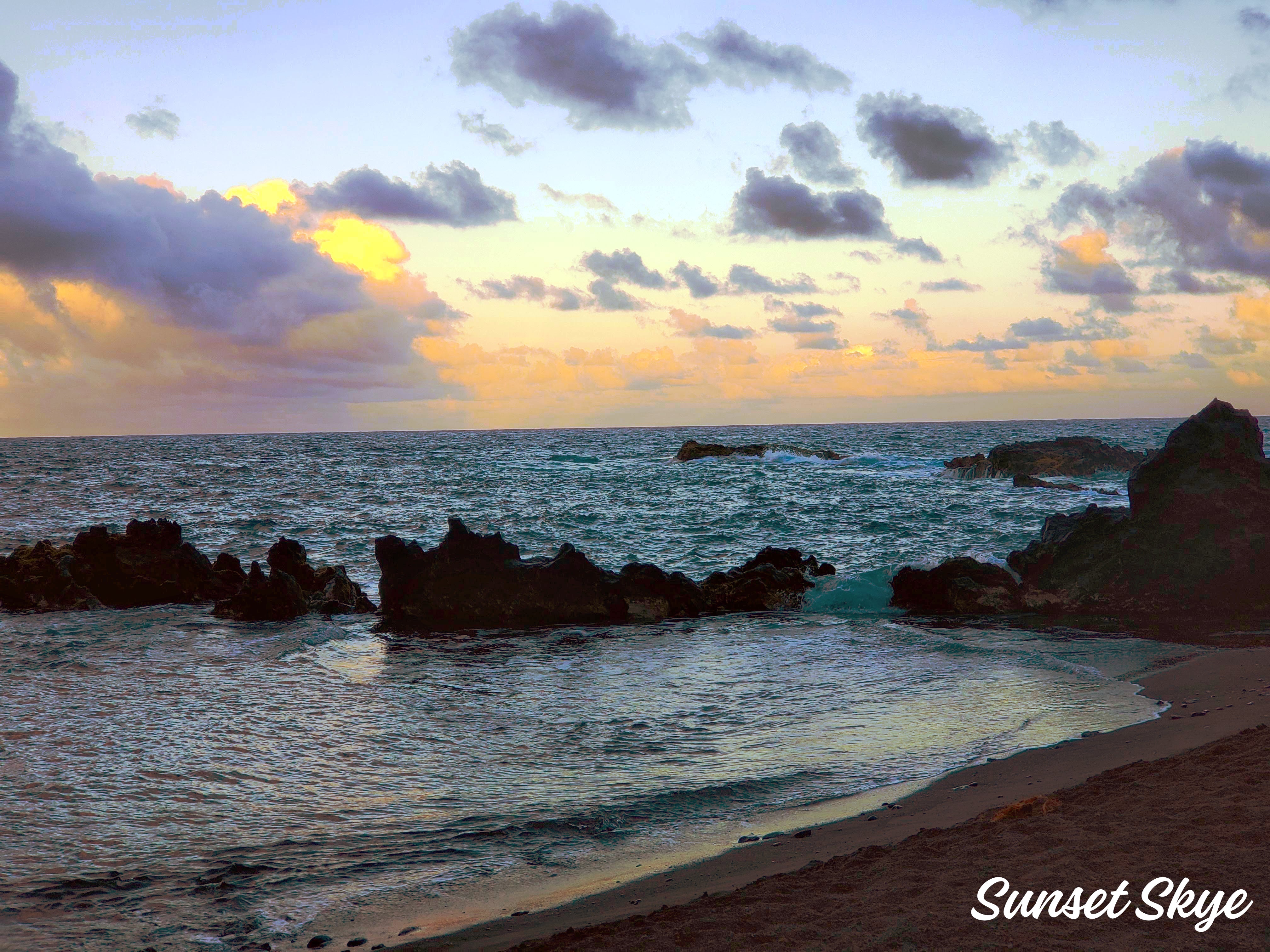 beautiful image of Hamoa Bay in Maui Hawaii at sunset